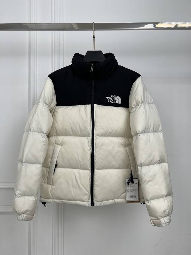 Thenorthface北面1996Nuptse 1996 经典款 The North Face“的字面含义为山的最寒冷、最艰难一面。它也是the North